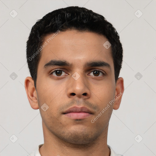 Neutral latino young-adult male with short  brown hair and brown eyes