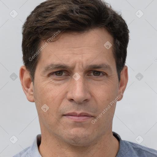 Neutral white adult male with short  brown hair and brown eyes