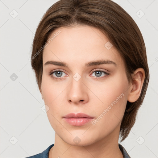 Neutral white young-adult female with medium  brown hair and grey eyes