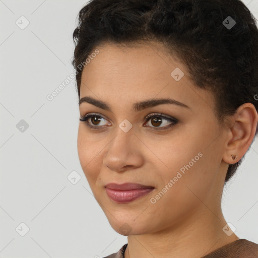 Joyful latino young-adult female with short  brown hair and brown eyes