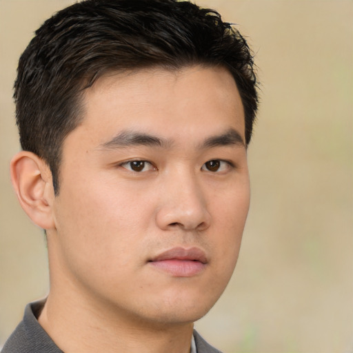 Neutral asian young-adult male with short  brown hair and brown eyes