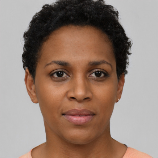 Neutral black young-adult female with short  brown hair and brown eyes