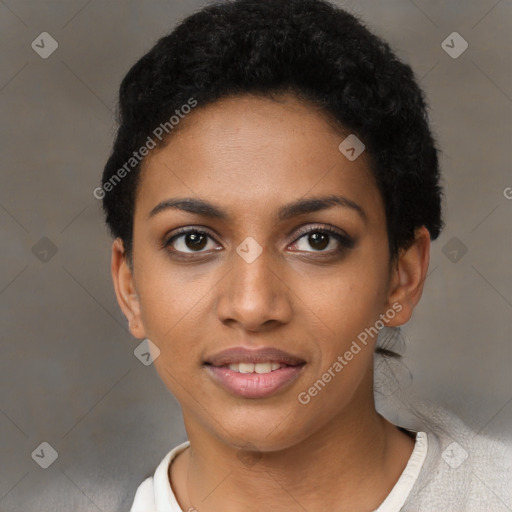 Joyful black young-adult female with short  black hair and brown eyes