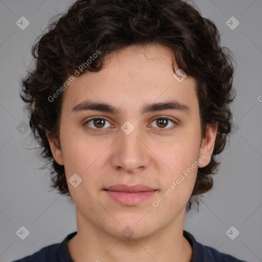 Joyful white young-adult male with medium  brown hair and brown eyes