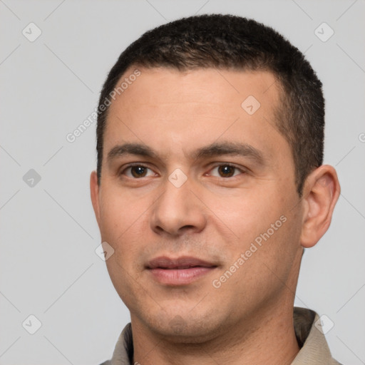 Joyful white young-adult male with short  brown hair and brown eyes