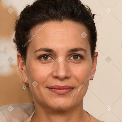 Joyful white adult female with short  brown hair and brown eyes