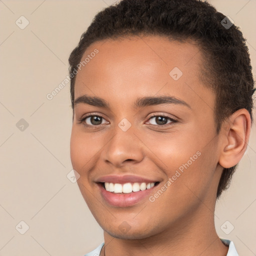 Joyful white young-adult female with short  brown hair and brown eyes