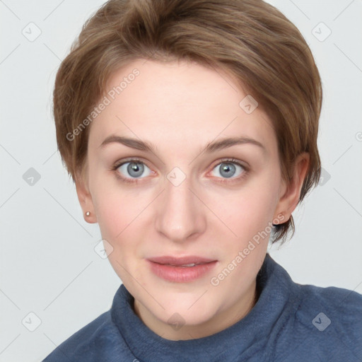 Joyful white young-adult female with short  brown hair and blue eyes