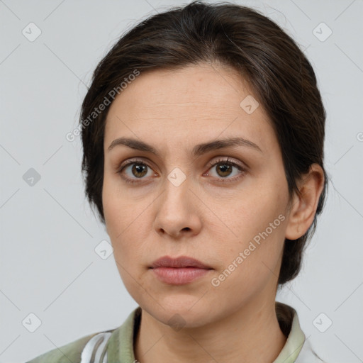 Neutral white young-adult female with medium  brown hair and brown eyes