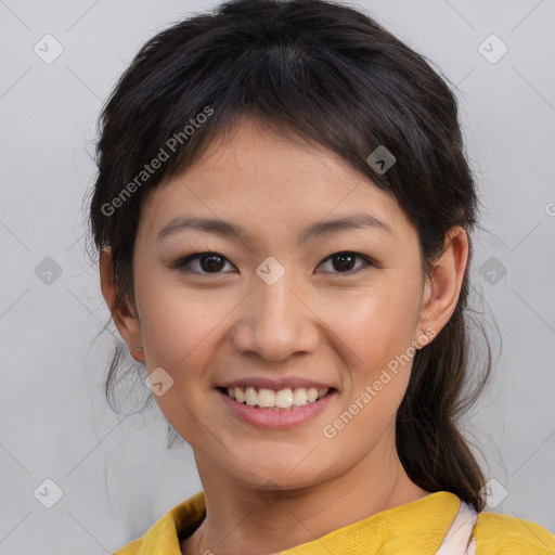 Joyful asian young-adult female with medium  brown hair and brown eyes