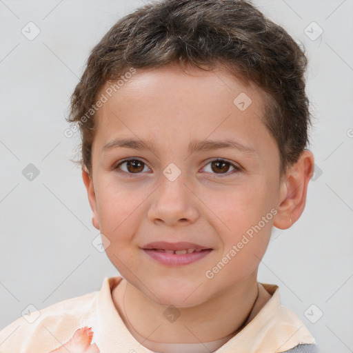 Joyful white child male with short  brown hair and brown eyes