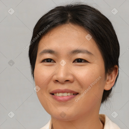 Joyful asian young-adult female with medium  brown hair and brown eyes