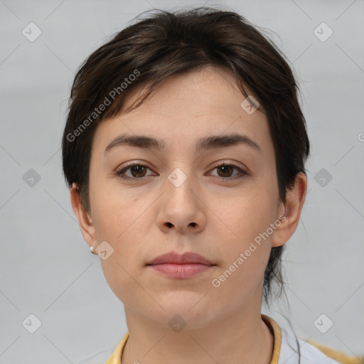 Neutral white young-adult female with medium  brown hair and brown eyes