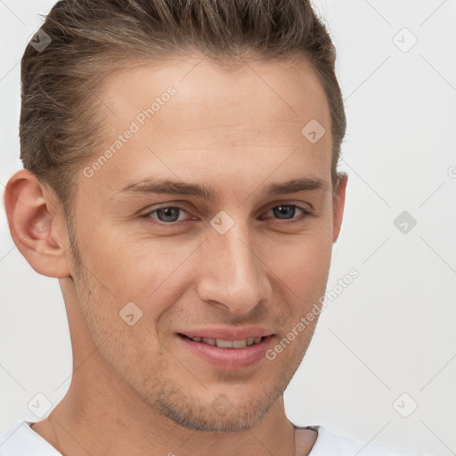 Joyful white young-adult male with short  brown hair and brown eyes