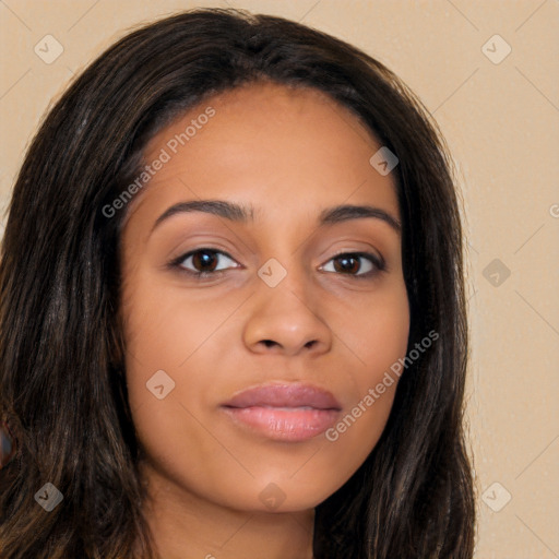 Joyful latino young-adult female with long  brown hair and brown eyes