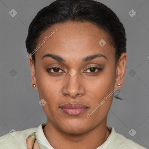 Joyful latino young-adult female with short  black hair and brown eyes