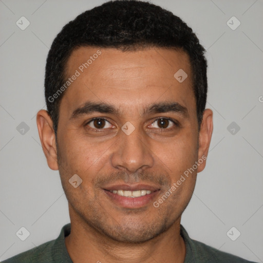 Joyful white young-adult male with short  black hair and brown eyes