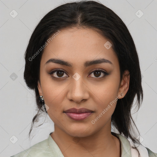 Joyful latino young-adult female with medium  black hair and brown eyes