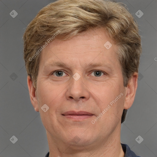 Joyful white adult male with short  brown hair and grey eyes