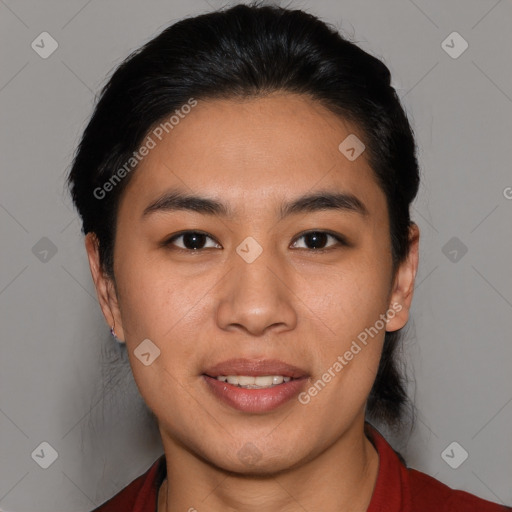 Joyful asian young-adult female with short  brown hair and brown eyes