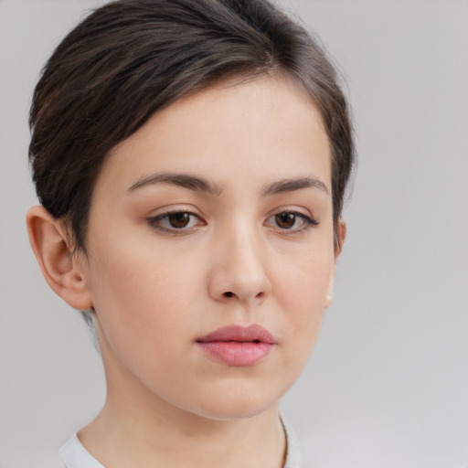 Neutral white young-adult female with short  brown hair and brown eyes