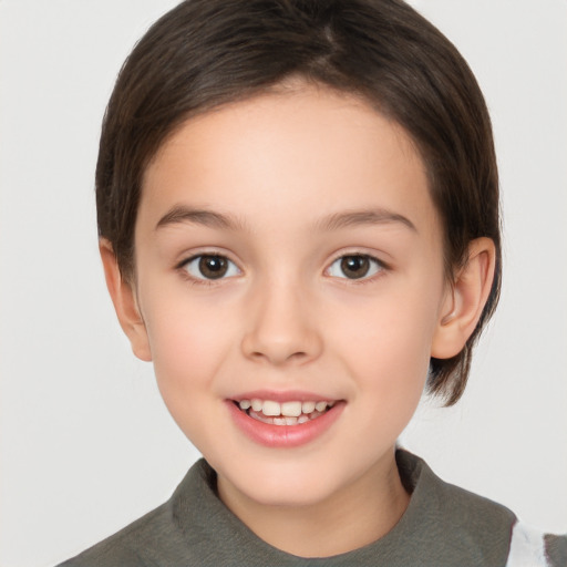 Joyful white child female with medium  brown hair and brown eyes