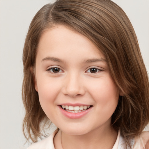 Joyful white child female with medium  brown hair and brown eyes