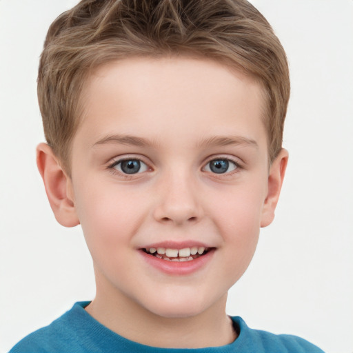 Joyful white child male with short  brown hair and grey eyes