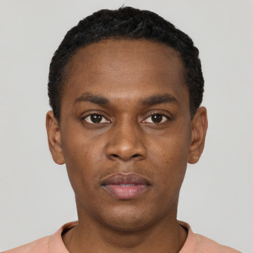 Neutral black young-adult male with short  black hair and brown eyes