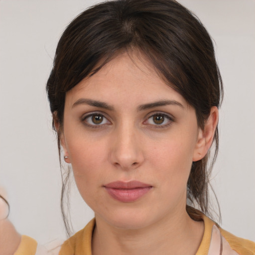Neutral white young-adult female with medium  brown hair and brown eyes