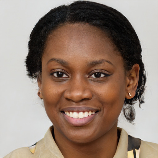 Joyful latino young-adult female with medium  black hair and brown eyes