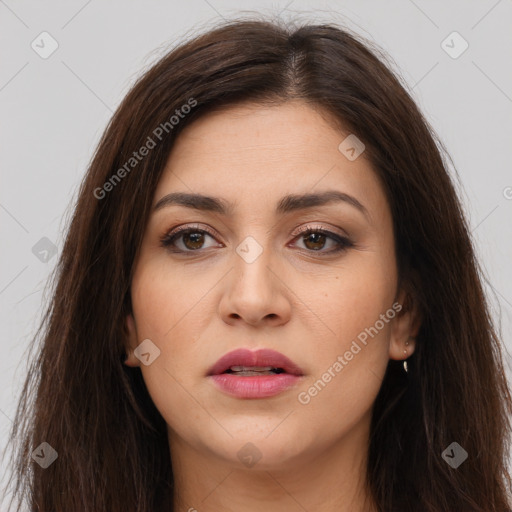 Joyful white young-adult female with long  brown hair and brown eyes