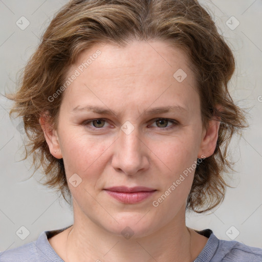 Joyful white young-adult female with medium  brown hair and blue eyes