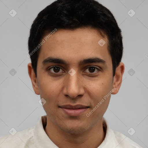 Joyful white young-adult male with short  black hair and brown eyes