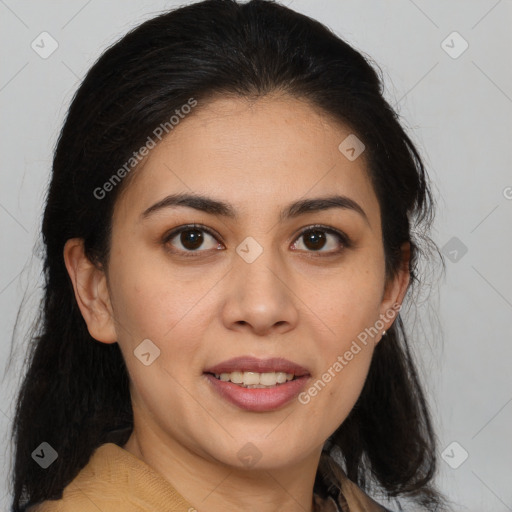 Joyful latino young-adult female with medium  brown hair and brown eyes