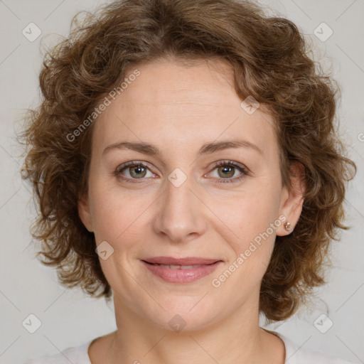 Joyful white young-adult female with medium  brown hair and green eyes