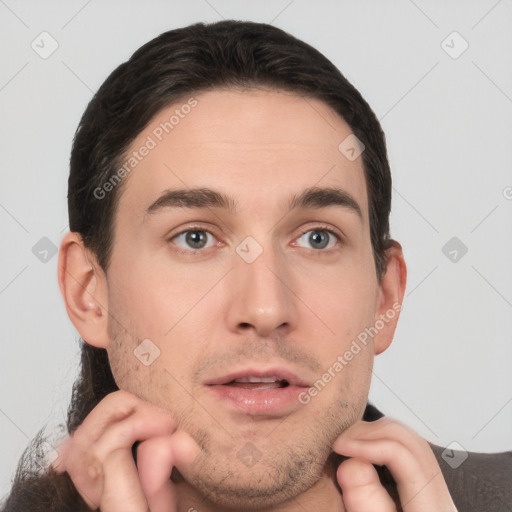 Neutral white young-adult male with short  brown hair and grey eyes