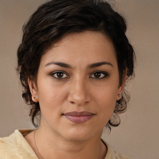 Joyful white young-adult female with medium  brown hair and brown eyes