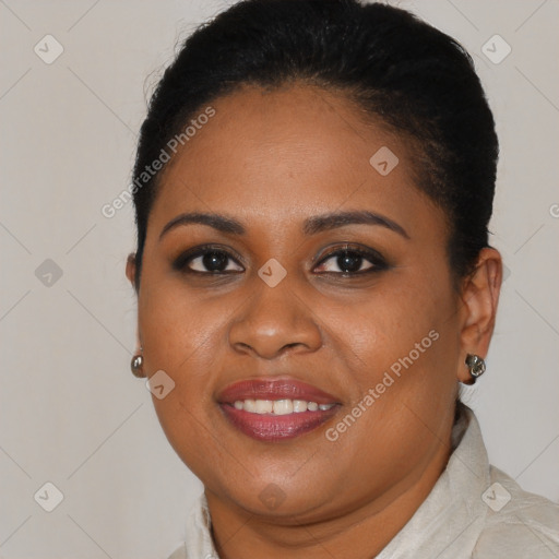 Joyful black young-adult female with medium  brown hair and brown eyes