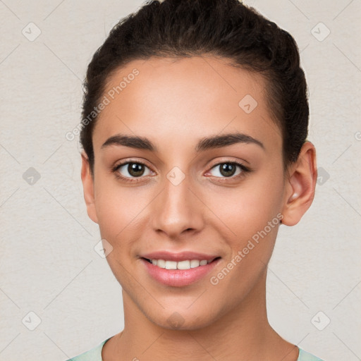 Joyful white young-adult female with short  brown hair and brown eyes