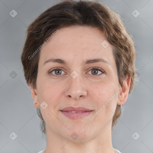 Joyful white adult female with short  brown hair and grey eyes