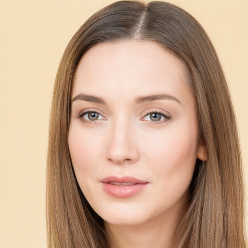 Neutral white young-adult female with long  brown hair and brown eyes