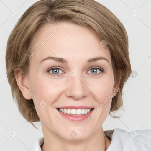 Joyful white young-adult female with medium  brown hair and blue eyes