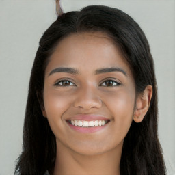 Joyful white young-adult female with long  black hair and brown eyes