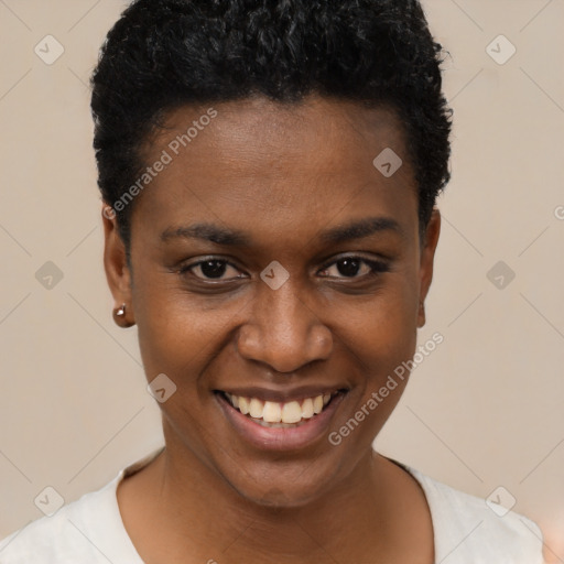 Joyful black young-adult female with short  black hair and brown eyes