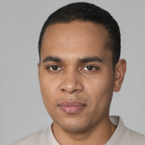 Neutral black young-adult male with short  black hair and brown eyes