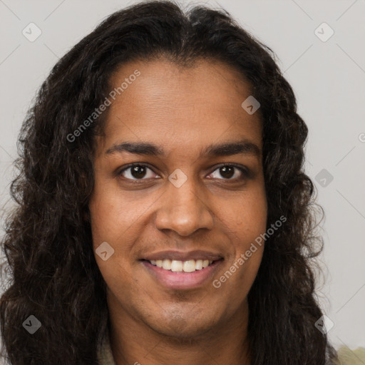 Joyful black young-adult female with long  brown hair and brown eyes