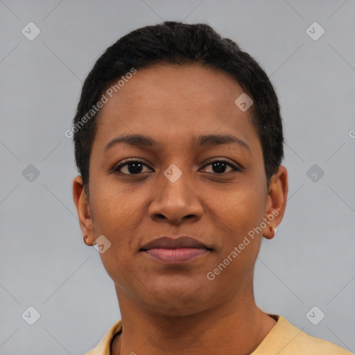 Joyful black young-adult female with short  black hair and brown eyes