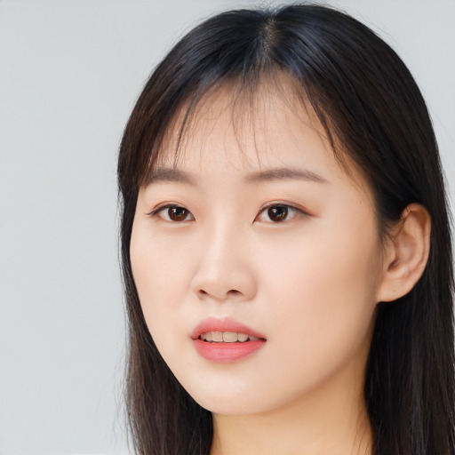 Neutral asian young-adult female with long  brown hair and brown eyes
