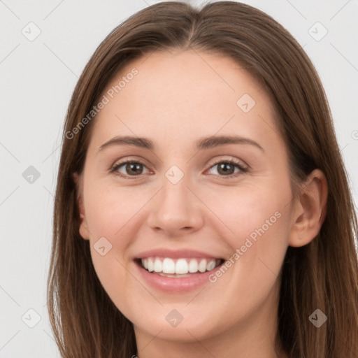 Joyful white young-adult female with long  brown hair and grey eyes